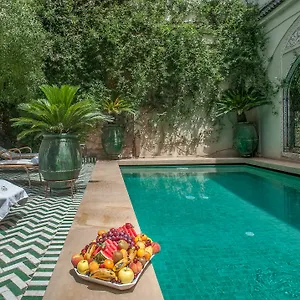 & Laurence Olivier Riad